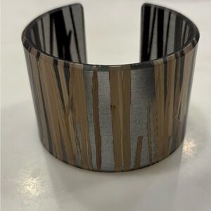 Stylish Black and Brown Watch with Unique Vertical Cutouts